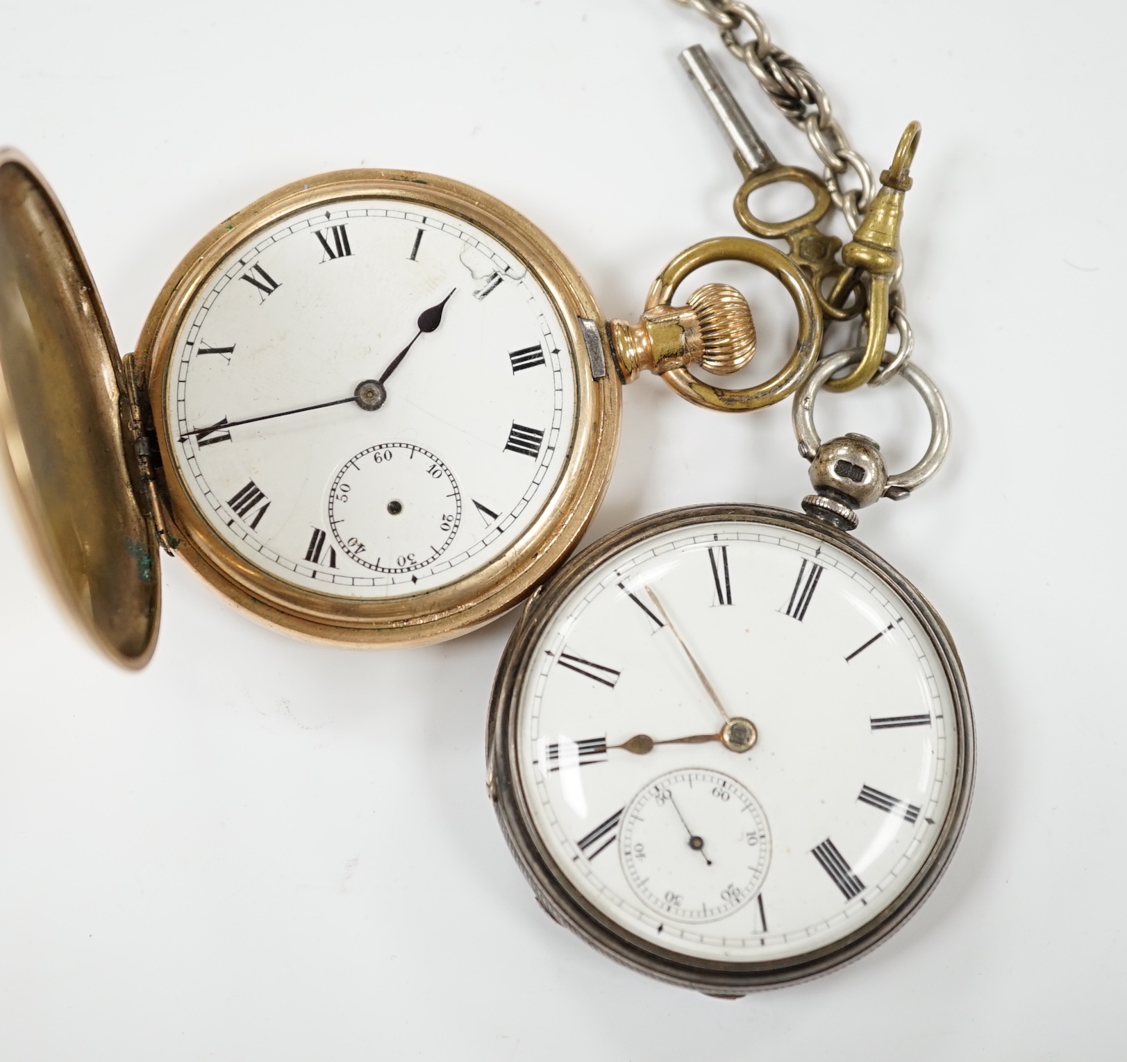 A 1920's silver open face pocket watch and a gold plated hunter pocket watch.